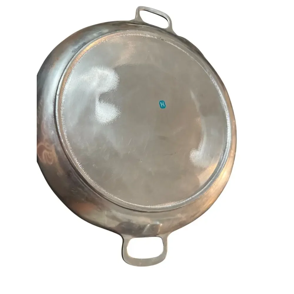 Hammered Aluminum Serving Tray from Mexico .Twelve inches diameter.